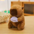 Lindo peluche de capibara marrón que sostiene un muñeco morado, juguete suave de regalo. - Carpincho cachorrito morado / 19cm