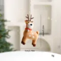 Handmade small felted reindeer hanging ornament with silver bell, measures 13cm in height - Deer