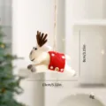 Handmade felt reindeer hanging ornament decoration with red polka dot saddle detail - Flying Fawn