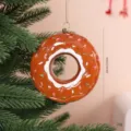 Brown donut-shaped Christmas tree ornament with white icing and colorful sprinkles - OPP Bag / Donut