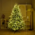 1.8m high large Christmas tree with warm yellow LED lights for festive holiday decor. - PE Larch Christmas Tree With 30m 300 LEDs / 150cm