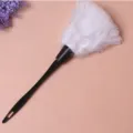 White feather duster with black plastic handle, ideal for daily household cleaning tasks. - One Size / Feather Duster