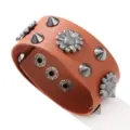 Vintage brown punk style wide leather bracelet featuring metal flower and cone rivet decor - Brown
