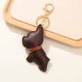 Llavero de bulldog francés en cuero marrón con gancho dorado, accesorio para bolso - Café