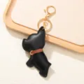 Llavero de bulldog francés en cuero negro con herrajes dorados para bolso - Negro