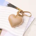 Brown PU leather heart-shaped keychain pendant for bags or car keys with strap - Beige