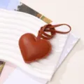 Minimalist brown PU leather heart-shaped charm for bag accessory or car keychain decoration - Brown