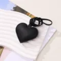Chic black heart-shaped PU leather bag charm and car keychain accessory for women - Black