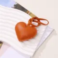 Elegant brown PU leather heart-shaped pendant keychain for bag charms and car keys - Brown