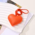 Handmade vibrant orange PU leather heart charm with matching strap for bags or keys - Orange