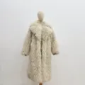 Detail of cream faux mongolian sheep fur coat with suit collar and thick texture - S / Apricot