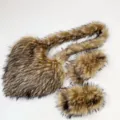 Close-up detail of faux raccoon fur heart-shaped crossbody bag and matching slippers set - Natural Raccoon Fur (Shoes & Bag Set) / 46 (US 13)