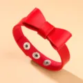 Bracelet nœud en cuir PU rouge avec boutons-pression réglables pour un style punk - Rouge