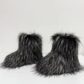 Dettaglio stivali in ecopelliccia per bambini in nero e grigio striato - 32 (1Y) / Nero con punte bianche