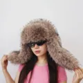 Oversized Y2K style faux raccoon fur trapper hat in light brown, perfect for winter skiing - Milk Tea