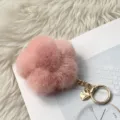 High-quality pink mink fur flower keychain with gold heart pendant for bags and keys. - Smiley Face Version Hardware - Korean Pink & Dusty Pink