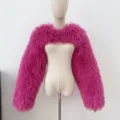 Vibrant pink faux Mongolian lamb fur cropped shrug showing shaggy texture details - M / Rose Red