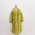 Detailed view of women's lime green faux Mongolian lamb fur coat on a mannequin. - S / Olive Green