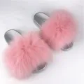 Stylish silver PVC sole slides with fluffy pink raccoon fur for summer indoor outdoor wear - Pink