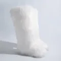 Side profile of plush white faux fox fur knee-high snow boots for winter warmth - 36 / White