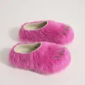 Macro view of bright pink furry claw slippers with metallic silver stud accents. - 36-37 (US 5-6) / Rose Red