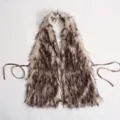 Sexy brown faux fur halter top with silver cross pendant and open back design for women - One Size / Frosted Brown