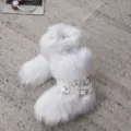 White faux fur snow boots with punk rivet belts and Y2K platform style for women - 36 / White