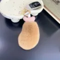 Detail view of plush chicken drumstick keychain made of soft brown rex rabbit fur - 12cm / Khaki