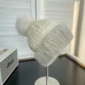 White quilted down hat with gray mink fur trim and fox fur pompom detail - One Size / Beige