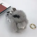 Close-up of grey 8cm mink fur bunny keychain charm with soft texture and gold ring - Gemstone Grey