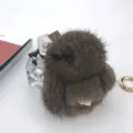 Detailed view of an 8cm brown mink fur rabbit keychain showing soft, fluffy texture - Brown