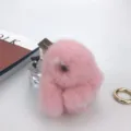 Exquisite soft pink mink fur rabbit charm keychain detail showing fluffy texture and bow - Pink