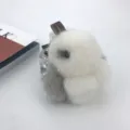 Detailed view of a soft white and grey mink fur bunny keychain with a leather strap - White with Jewel Gray Ears