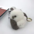 Detail of 8cm mink fur rabbit keychain with soft white and brown plush texture - White with Brown Ears