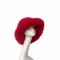 Stylish red faux fox fur bucket hat with fluffy texture and adjustable fit for winter - Red