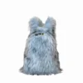 Macro view showing the fluffy texture of a Y2K light blue faux fur backpack with bunny ears - Light Blue