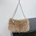 Elegant camel faux fur underarm baguette bag with chunky silver chain strap for evening events - Brown