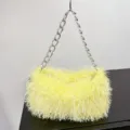 Elegant fuzzy yellow baguette handbag featuring a chunky silver chain strap for evening events - Yellow