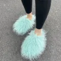 Stijlvolle muntgroene Mongoolse bontslippers met een zeer pluizige zachte textuur - Muntgroen