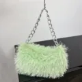 Trendy light green fuzzy plush underarm handbag featuring a chunky silver chain strap - Mint Green