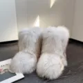 Chic Y2K style white faux fox fur snow boots featuring thick soles for winter fashion - 36 / White