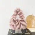 Elegant faux fox fur handbag in dusty pink featuring a stylish gold chain strap. - 30*35*9 / Pink