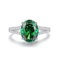 Elegante ring met ovale groene edelsteen en gespleten schacht met pavé in zilver. - Maat 5 / Smaragd (FDJZ-465)