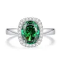 S925 sterling zilveren ring met een grote ovale groene edelsteen en sprankelende halo. - Maat 5 / Ovale Halo Stijl (FDJZ-472) / Smaragd