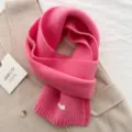Cozy pink knitted wool winter scarf for women, warm fashion accessory for cold weather. - Glitter