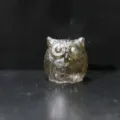 Handcrafted owl figurine made of translucent resin and decorative crushed stones. - Labradorite With Gold Foil