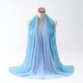 Elegant gradient light blue chiffon hijab scarf displayed on a mannequin torso detail view - 70x180cm / Cyan and Blue
