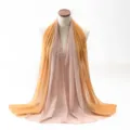 Detail view of lightweight gradient chiffon scarf in soft orange and pink tones - 70x180cm / Beige and Yellow