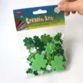Close-up view of green glitter foam clover stickers in a retail bag, detailed craft supply. - Shiny Glitter Shamrock 80 Pieces