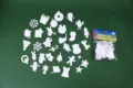 DIY Christmas EVA foam stickers set with assorted snowflake and tree shapes detail view - White